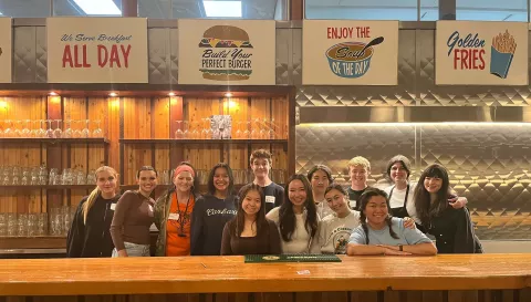 Students from UBC Sauder volunteering at A Better Life Foundation for their Plenty of Plates Program